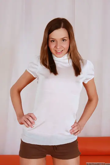 Candy Sweet – Brunette in Shorts Strips and Shows Her Tattoo