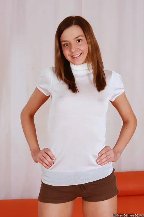 Candy Sweet: Brunette in Shorts Strips and Shows Her Tattoo – photo 3 of 15