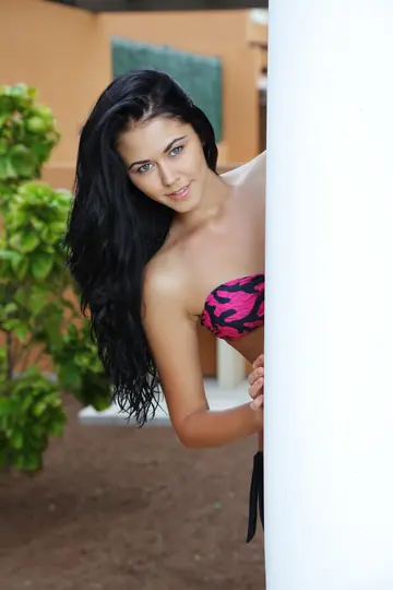 Slim Babe Strips Out of Her Bikini by the Pool