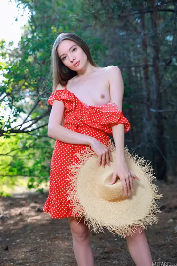 Brunette Strips Out of Her Skirt in the Forest