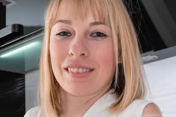 Blonde MILF in a Skirt Spreads Her Trimmed Pussy with Whipped Cream