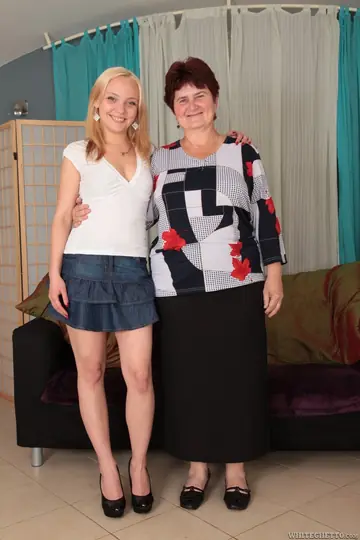 Blonde Woman Undresses and Spreads Her Pussy Wide