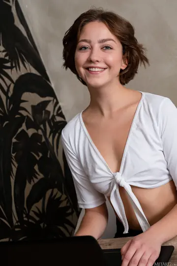 Short-Haired Brunette Spreads in Her Panties