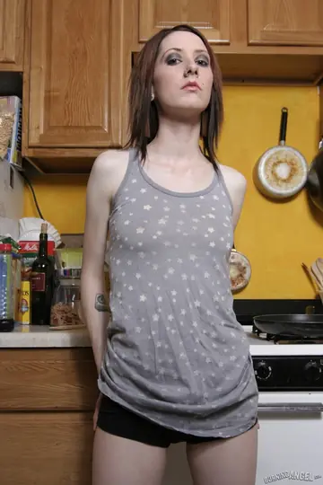 Short-Haired Woman Spreads Her Pussy