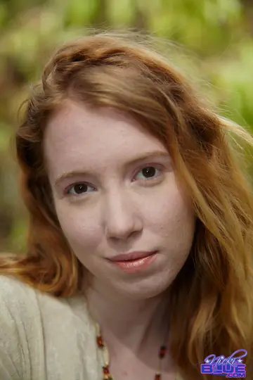 Nicki Blue – Busty Pale Redhead Wades into a Stream in a Skirt