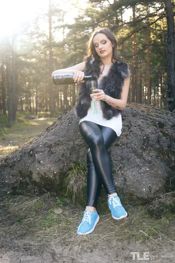 Maria Z – Brunette in Leather Yoga Pants Uses a Wine Bottle Deep in Her Pussy