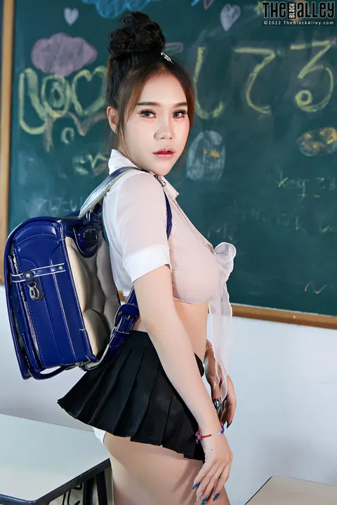 Japanese Brunette in Uniform Strips Down to Black Boots – photo 2 of 16