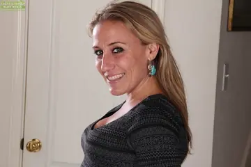 Thick MILF Strips Out of Her Skirt and Panties to Spread