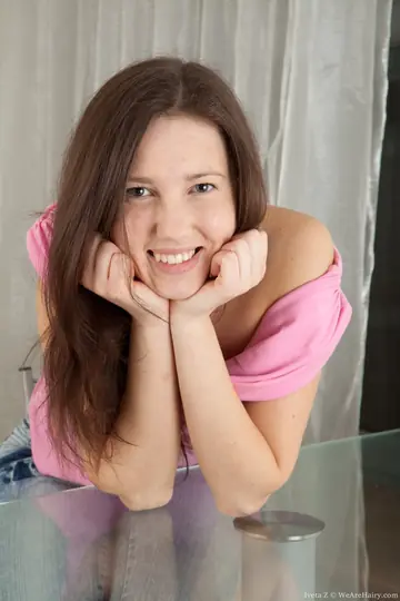 Brunette Strips Out of Her Jeans and Spreads Her Hairy Pussy on the Chair