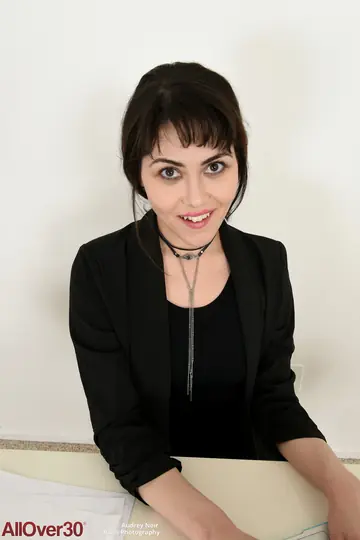 Short-Haired Brunette MILF Undresses at the Office and Fingers Her Hairy Pussy