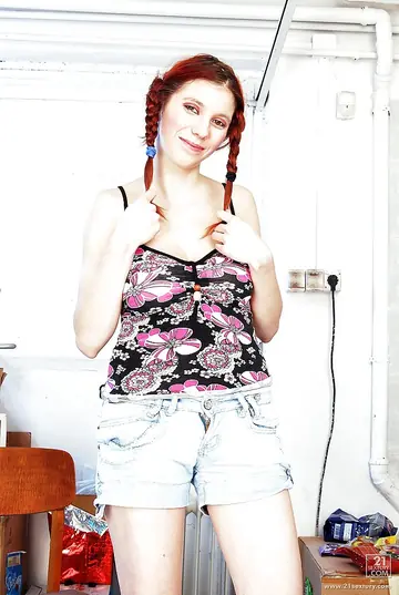 Busty European Redhead in Pigtails Pushes Shorts Aside