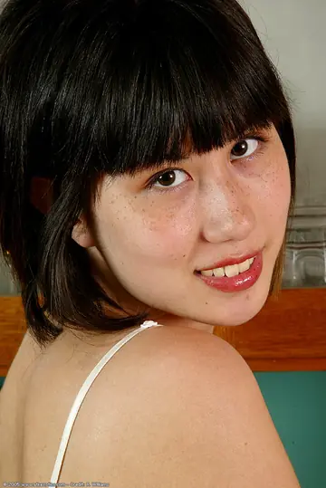 Thick Asian Brunette Pulls Panties Aside to Show Her Hairy Pussy