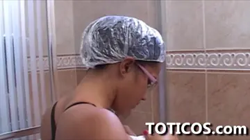 Busty Latina Ebony in a Bikini and Glasses Fingers Her Shaved Pussy