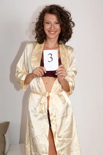 Emylia Argan – Brunette Amateur with Short Curly Hair Spreads Her Legs
