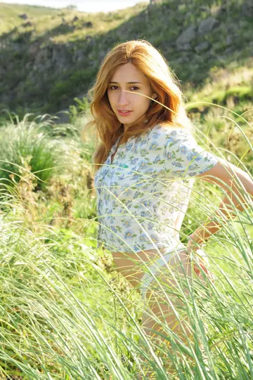 Latina Woman Strips Nude and Poses