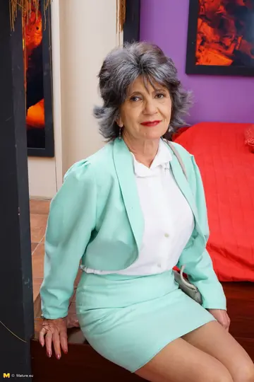 Busty Grandmother Strips Out of Her Skirt to Lingerie and Heels