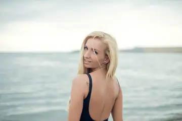 Blonde PAWG Poses in a Bikini on the Beach