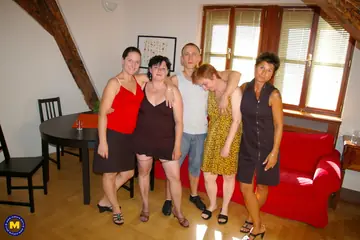 Mature European Women in Skirts Share a Gigolo for Group Sex