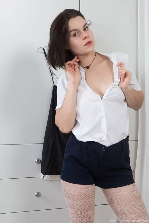Ole Nina: Short-Haired Brunette Removes Her Pantyhose and Spreads Her Hairy Bush – photo 2 of 16