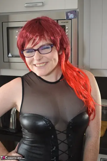 Mollie Foxxx – Tattooed Redhead MILF in Lingerie and Glasses Shows Her Big Tits