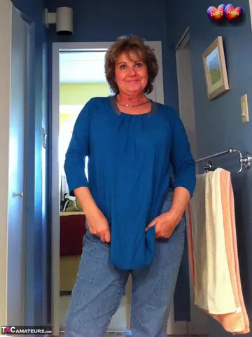 Bustybliss – Curvy Mature Brunette Strips Out of Her Lingerie and Jeans