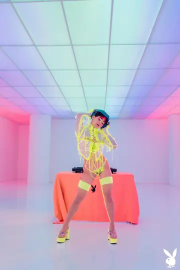 Mia Valentine – Tall Blonde with Short Hair Poses in a Fluorescent Outfit