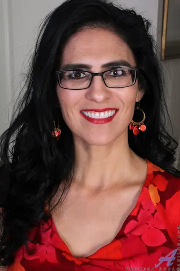 MILF in Glasses Spreads Her Shaved Pussy
