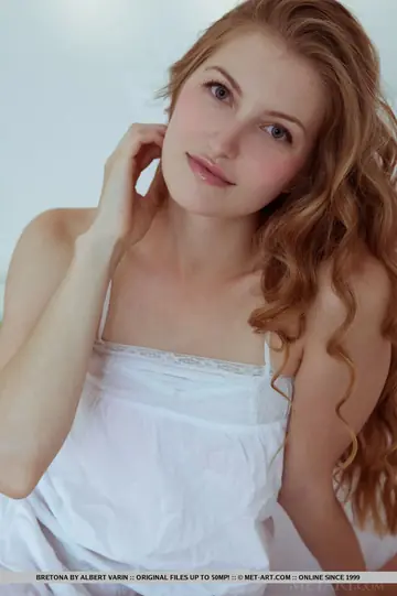 Redhead Strips Off Her Skirt and Panties to Spread Her Shaved Pussy