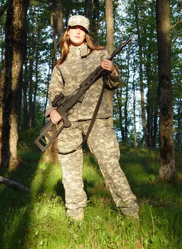Busty Military Babe Shows Lingerie and Bikini in the Forest