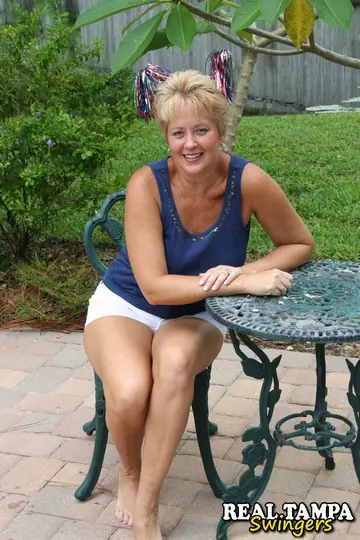 Busty Blonde MILF Fingers Her Hairy Pussy in the Garden