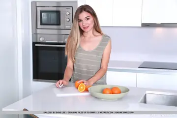 Kaleesy – Blonde PAWG Strips Naked and Spreads on a Kitchen Stool