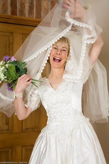 Hazel May – Blonde Bride Strips Off Her Wedding Dress to Show Stockings and Hairy Pussy