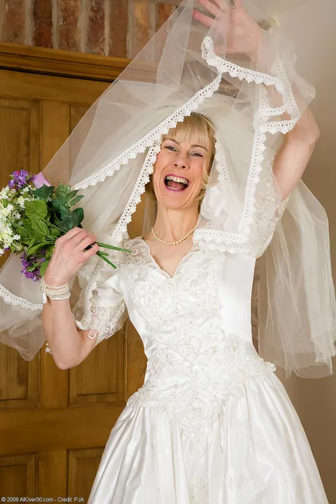 Hazel May: Blonde Bride Strips Off Her Wedding Dress to Show Stockings and Hairy Pussy – photo 1 of 21