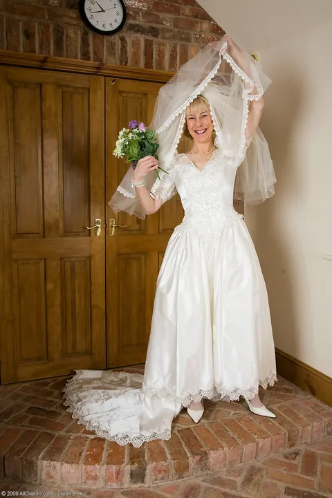 Hazel May: Blonde Bride Strips Off Her Wedding Dress to Show Stockings and Hairy Pussy – photo 2 of 21
