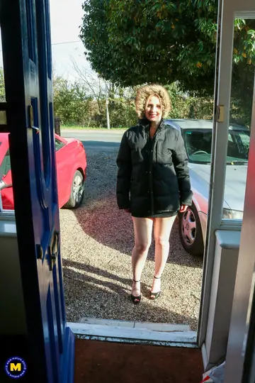 Mature Blonde MILF in Lingerie and Stockings Sucks Her Dildo