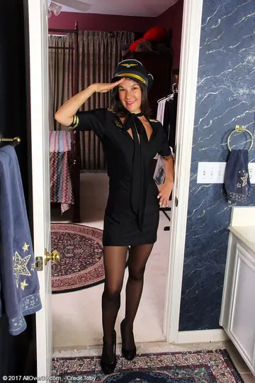 Mindy Johansen – Mature Brunette Strips Off Her Uniform and Pantyhose to Spread Her Pussy