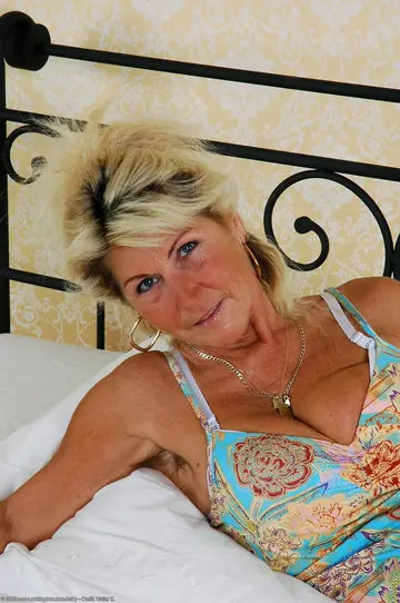 Blonde MILF Shows Her Hairy Pussy