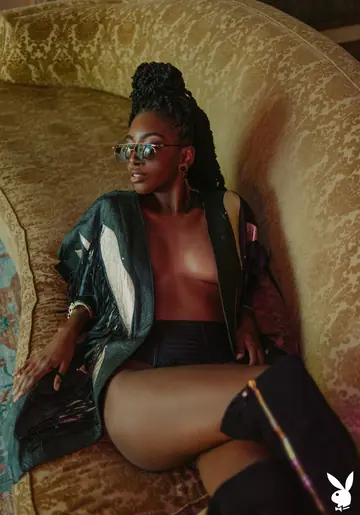 Ebony Brunette in Glasses Shows Off Her Breasts and Ass