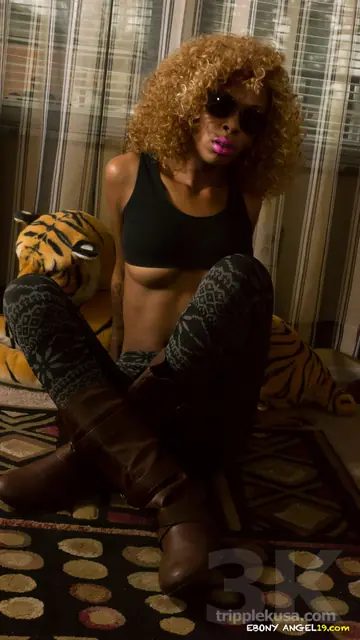 Ebony Babe in Glasses Strips Nude and Shows Her Big Ass