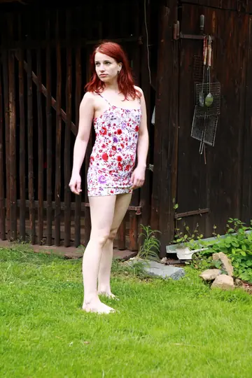 Pale Redhead Strips Out of Her Skirt on the Lawn