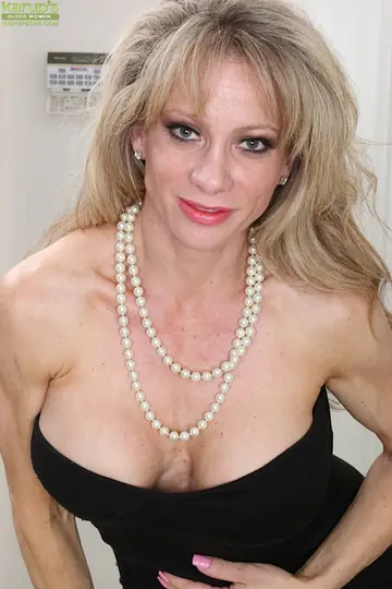 Christina Brim – Mature Blonde Strips and Masturbates with Her Legs Spread