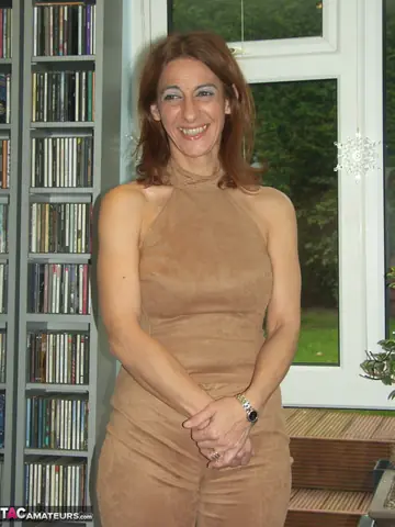 Thick Redhead MILF Rides a Balding Man on a Chair