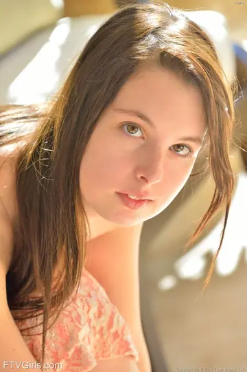 Petite Brunette Undresses and Spreads Her Pussy Wide
