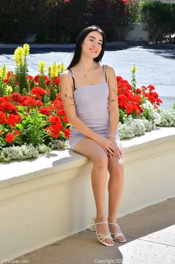 Skinny Woman in a Dress Spreads Her Pussy Outdoors