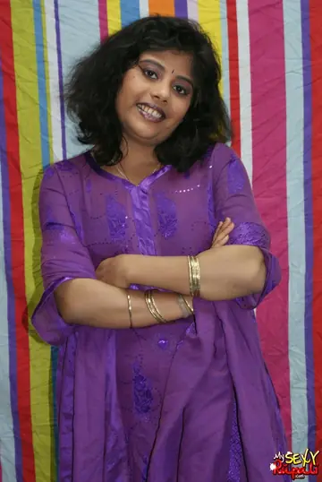 Indian MILF Undresses and Spreads Her Legs