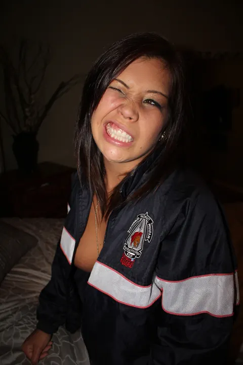 Thick Asian Brunette in Uniform Flashes Her Big Tits – photo 6 of 15