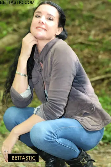 Athletic Brunette MILF Shows Her Fit Body in Jeans Outside