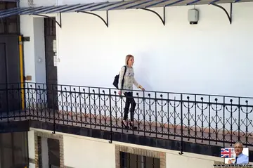 Slim European Blonde Strips Out of Leather Pants to Finger Herself