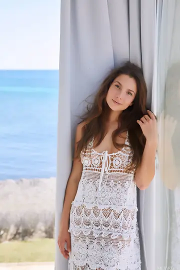 Ukrainian Brunette Undresses Fully and Poses Nude