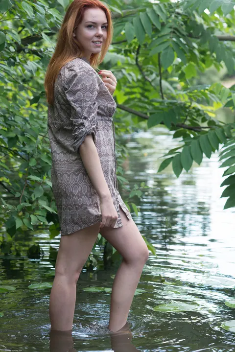 Candy Red: Redhead Spreads Her Shaved Pussy in the Forest – photo 2 of 20